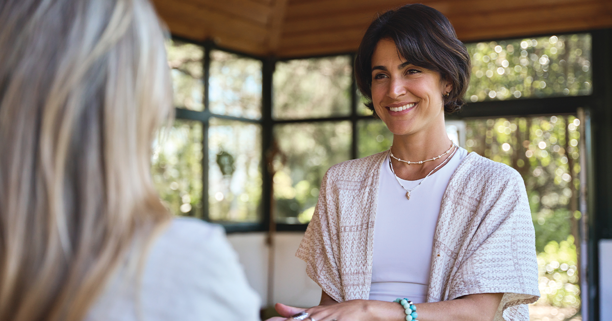 Two women talking.