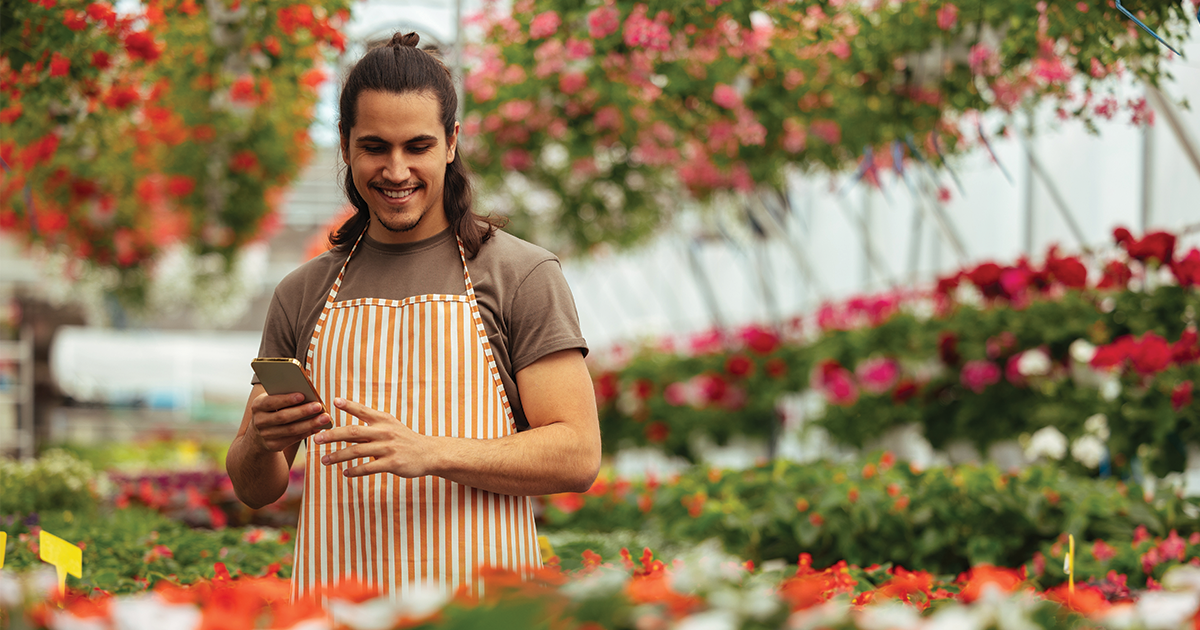 Man working in a flower shop on SPRAVATO® treatment.