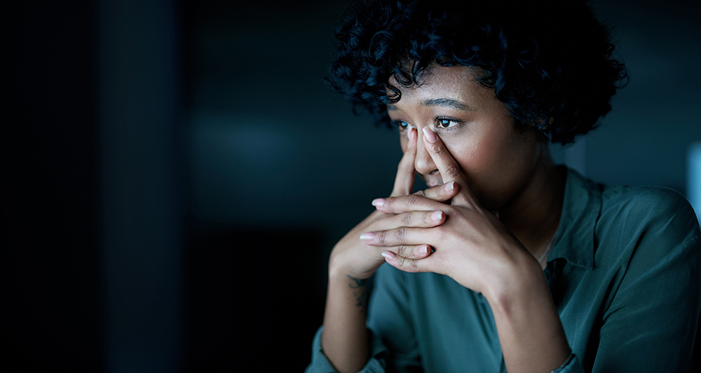 Shot of a young businesswoman looking stressed